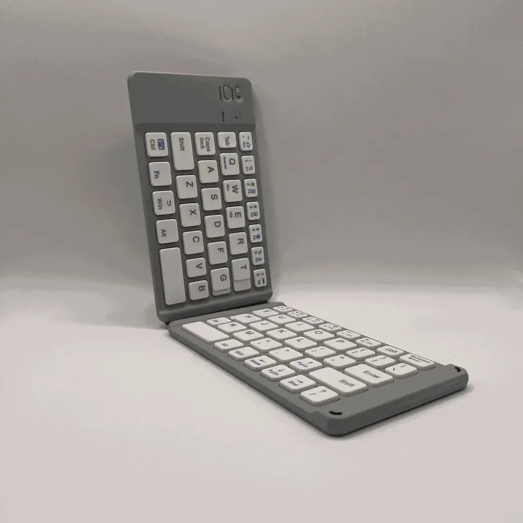 Clavier Bluetooth Pliable – Disposition QWERTY avec Batterie Rechargeable